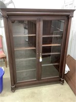 Beautiful mahogany bookcase/cabinet with key.   60