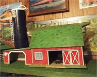 Vintage tin barn with silo and animals. Barn
