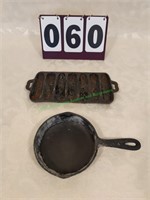 Small cast iron skillet and corn bread skillet