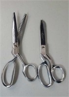 2 pairs of scissors 1 is crimped