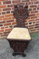 Carved Antique Accent Chair w/ shield & double