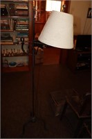 Wrought iron floor lamp and a wood and cast iron