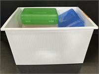 White storage container with pencil cases