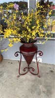 Metal pot with flowers