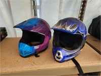 Two motorcycle helmets, size M and L