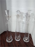 Three mouth blown Napa bottle decanters. Approx