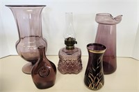 Purple glass vases, bottle, lamp