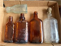 Vintage amber and clear bottles