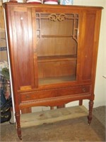 Antique cabinet with glass door and single