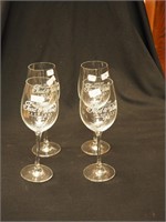 Four advertising 9" high wine goblets marked