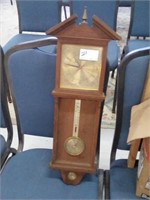 Clock with thermometer