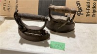 2 vintage sad irons, wood handles