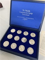 12 Sterling Proof medals