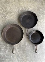 3 cast-iron Lodge skillets frying pans, a 12 inch