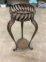 Metal and wicker plant stand