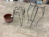 Two plant stands and one ceramic planter