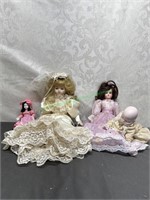Assort of porcelain, bisque, and china dolls