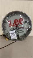305. Lee Clothes Round Clock