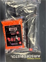 Airsoft postal and bag of bbs
