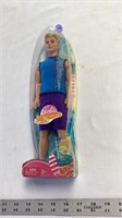 Collectible Barbie in a mermaid tale.