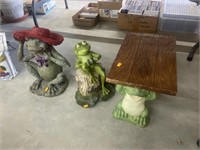 Decorative frog statues and bench