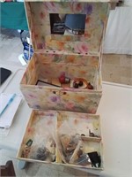 Pastel travel box full of trinkets