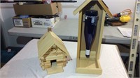 Wooden bird house and wine bottle bird feeder