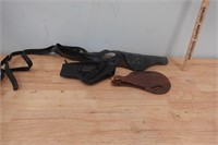 Leather and other pistol holsters