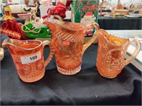 3 Carnival glass pitchers