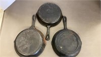 3 cast iron pans