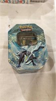 Pokémon trading cards and tin