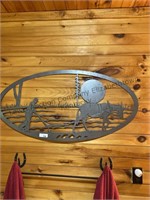 Metal carving of plowing approximately 43x23”