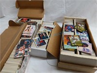 Four boxes of sports cards mostly basketball