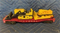 RED 6175 LIONEL FLATBED CAR WITH A YELLOW PLASTIC