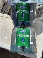 4 canisters of Propane