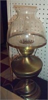 Old brass toned lamp w clear glass globe Works