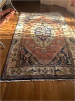 Rug measuring 8 1/2 ft x 5 ft, no fringe