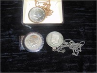 Box full of Kennedy Half Jewelry