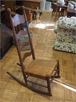 Highback oak sewing rocker with woven seat,