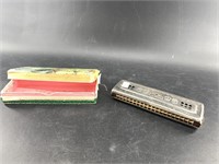 Vintage Echo harmonica keyed in G in good working
