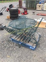 METAL PATIO TABLE W/ (3) GREEN CHAIRS