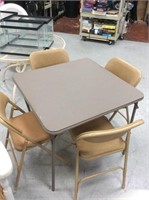 Folding card table with four chairs