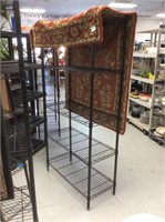 Tall black metal storage rack