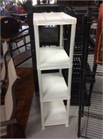 White four shelf storage rack
