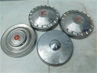 4 vintage hubcaps, 3 are Rambler.