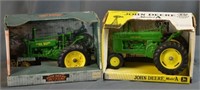 2 John Deere Toy Tractors