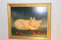 Gold frame picture of a pig and strawberries by