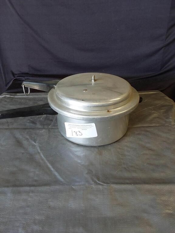 Pressure Cooker With Utensils