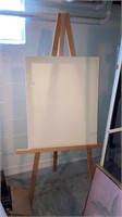 Large wooden easel & blank canvas