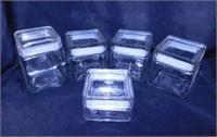 5 glass square storage canisters, tallest is 6"
